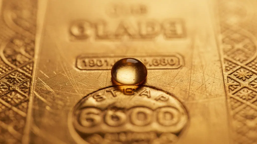 Extreme close-up of gold bullion bar surface showing tactile hallmark textures and reflections under controlled studio lighting